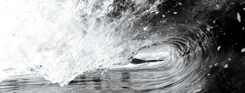 Clear Waves splashing over rippled sea surface. Photo by Kammeran Gonzalez-Keola